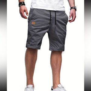 Men’s Solid Patched Color Pocket Drawstring Waist Cargo Shorts